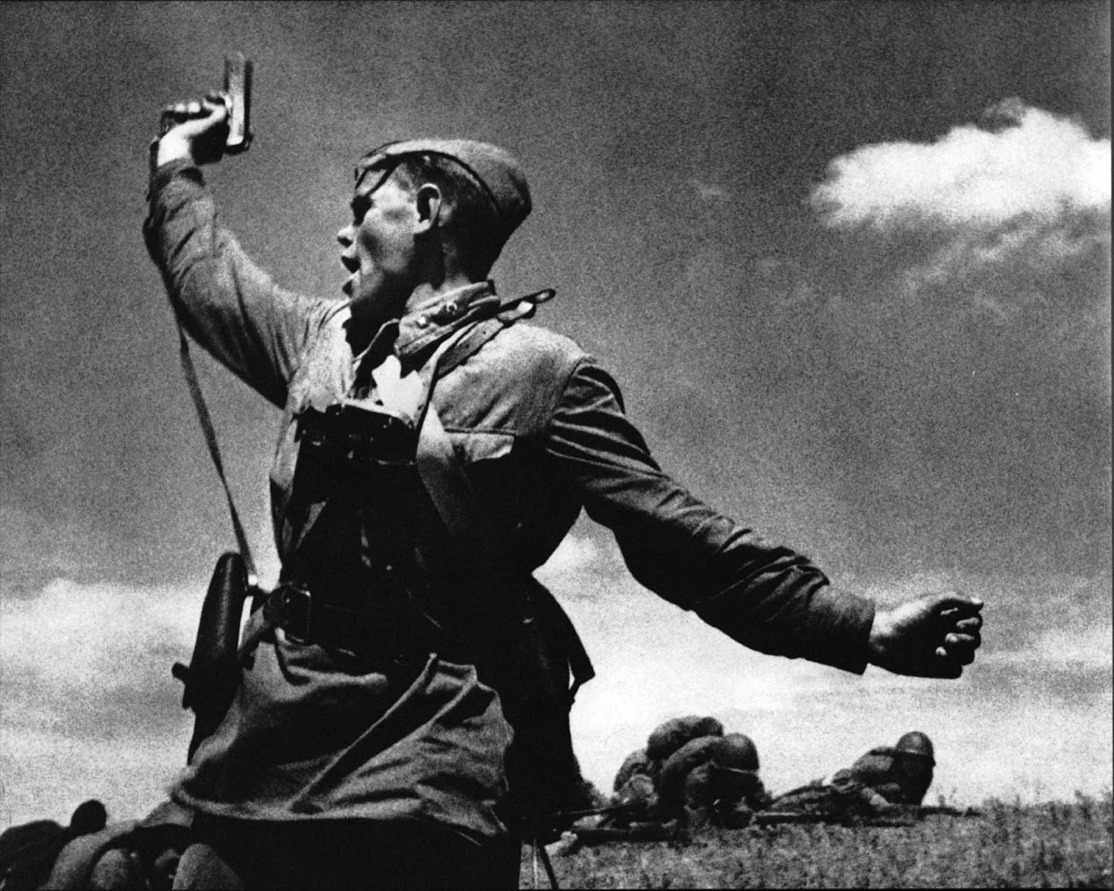 Political commissar Alexey Yeremenko leads his men into combat, he was killed minutes after this photo was taken, 1942